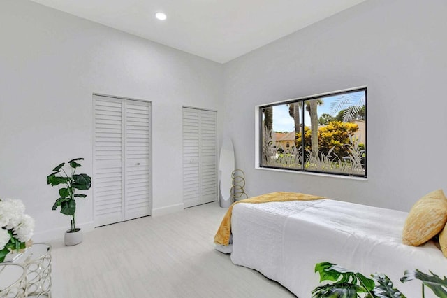 bedroom with two closets