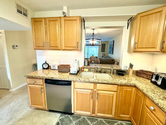 kitchen featuring light tile patterned flooring, sink, hanging light fixtures, stainless steel dishwasher, and light stone countertops