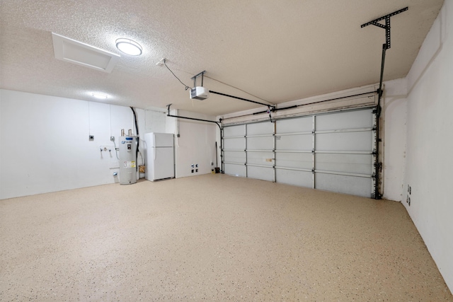 garage with white fridge, a garage door opener, and water heater