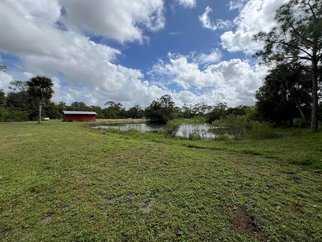 view of yard with a water view