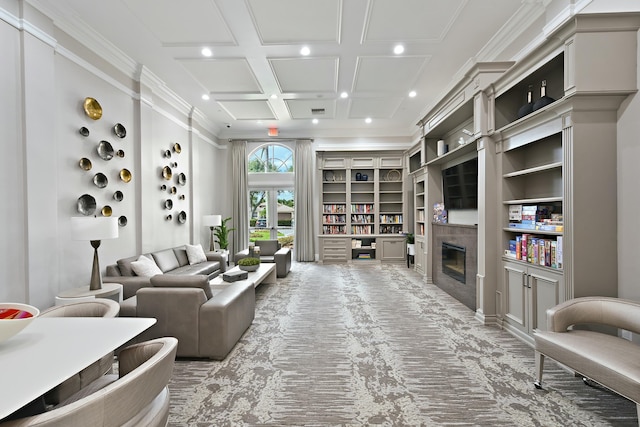 living room with carpet flooring, crown molding, built in features, and coffered ceiling