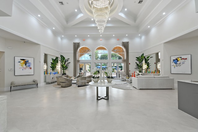 living room with coffered ceiling, beamed ceiling, a high ceiling, and a notable chandelier