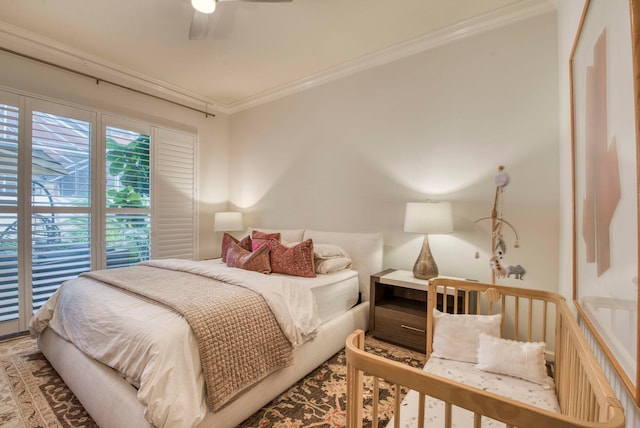 bedroom featuring ceiling fan and ornamental molding