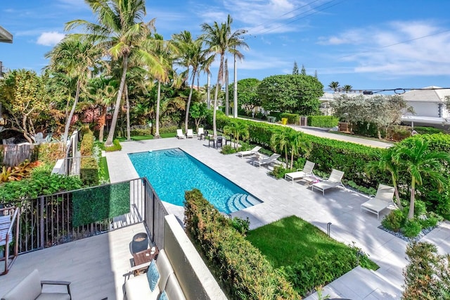 view of pool featuring a patio