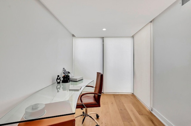 office space featuring light hardwood / wood-style flooring