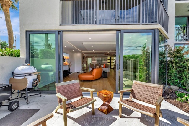 view of patio / terrace with a balcony