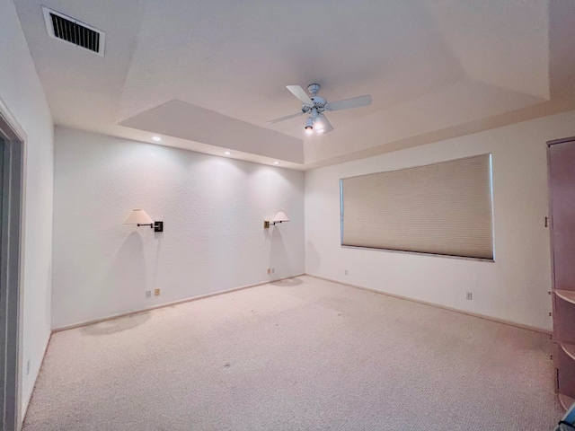 unfurnished living room featuring high vaulted ceiling, a skylight, wood-type flooring, and ceiling fan