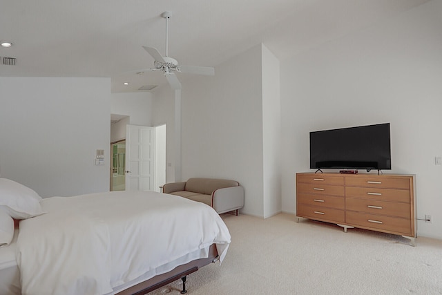 bedroom featuring light colored carpet, ceiling fan, and vaulted ceiling