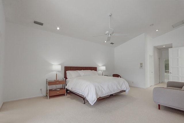 carpeted bedroom featuring lofted ceiling and ceiling fan