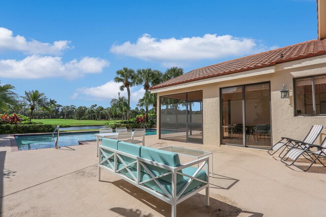 view of swimming pool featuring a patio