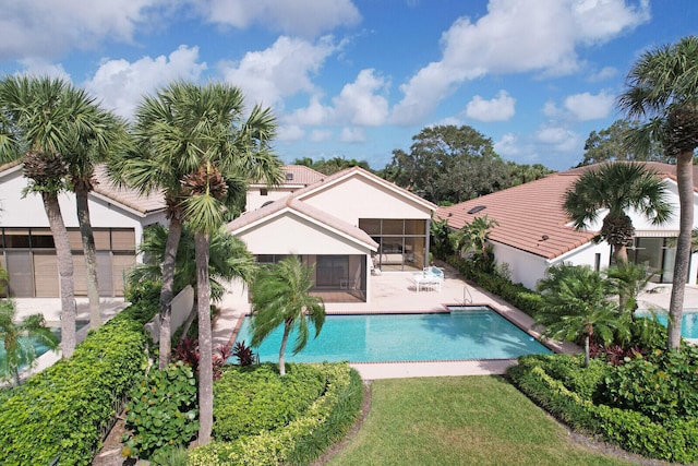 view of swimming pool with a patio