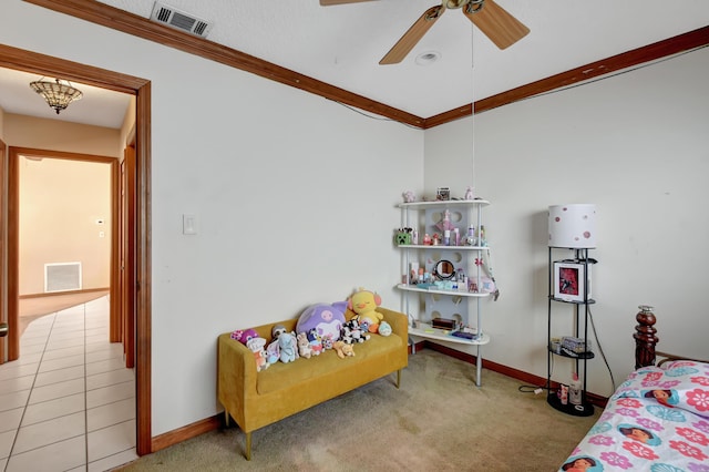 bedroom featuring light colored carpet, ceiling fan, and ornamental molding