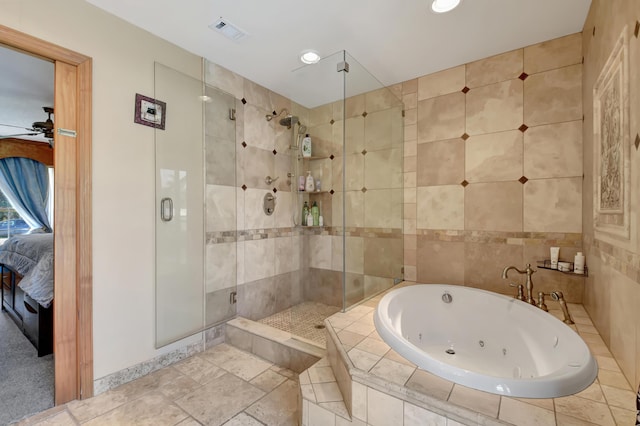 bathroom with separate shower and tub