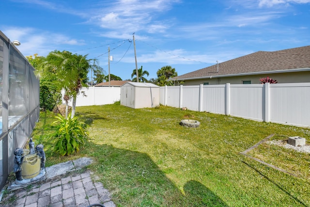 view of yard with a shed