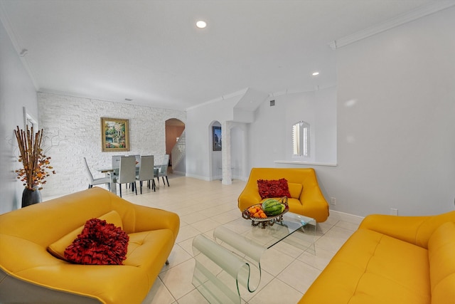 living room featuring crown molding and light tile patterned floors