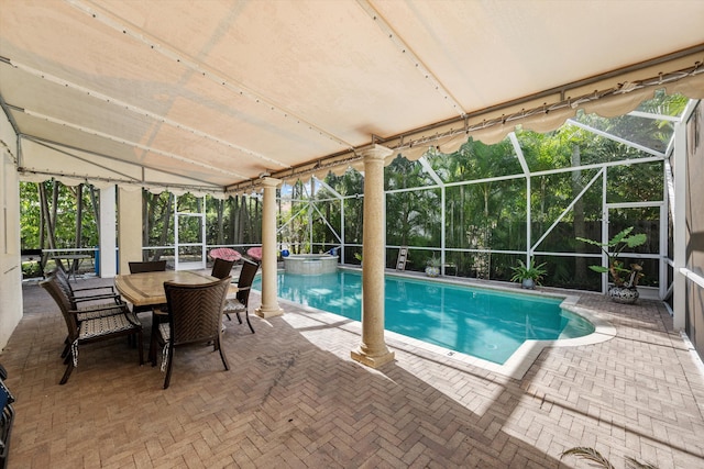 view of pool featuring a lanai and a patio area