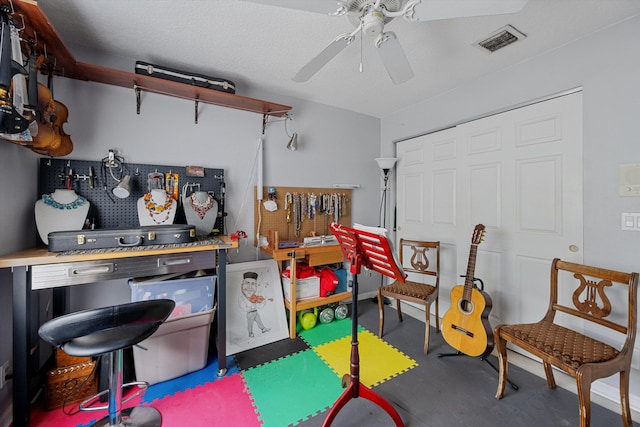 playroom featuring ceiling fan