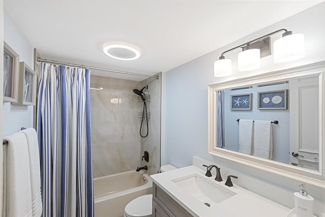 full bathroom featuring vanity, toilet, and shower / tub combo with curtain