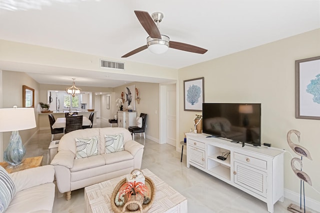 living room featuring ceiling fan