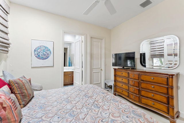 bedroom featuring ensuite bathroom and ceiling fan