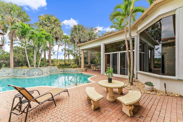 view of pool with a patio area