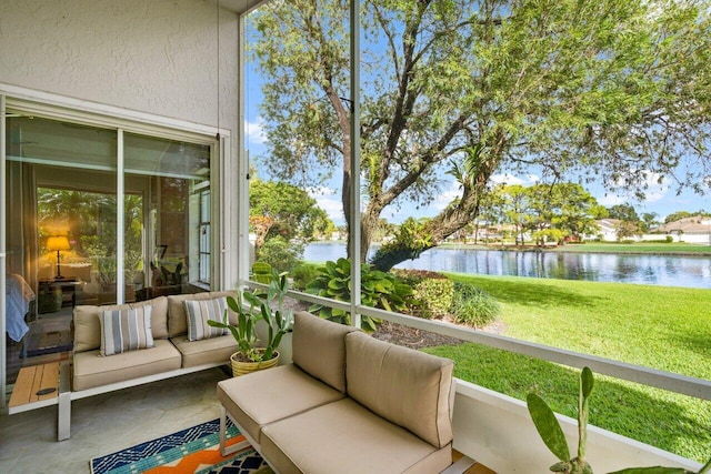 sunroom with a water view