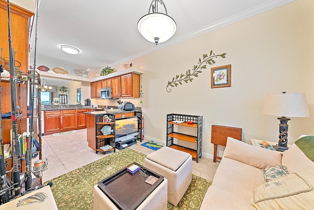 living room featuring a notable chandelier, light tile patterned flooring, a textured ceiling, and ornamental molding