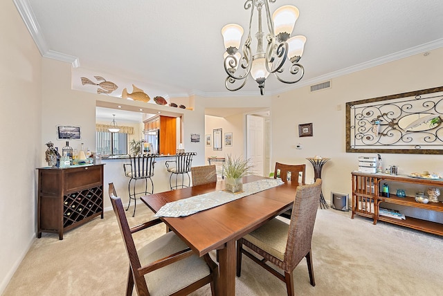 carpeted dining space featuring a chandelier and crown molding