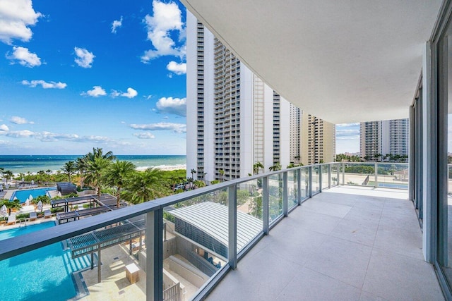 balcony featuring a water view