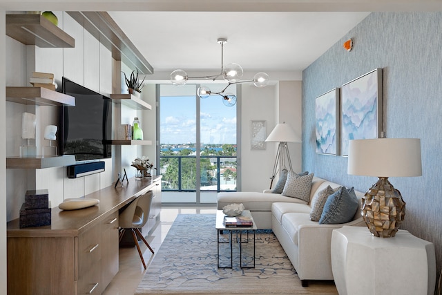 living room featuring floor to ceiling windows, an inviting chandelier, and plenty of natural light