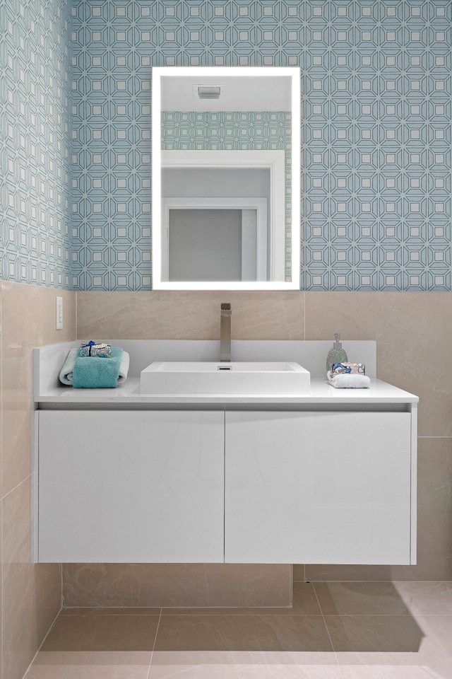 bathroom with vanity and tile patterned flooring