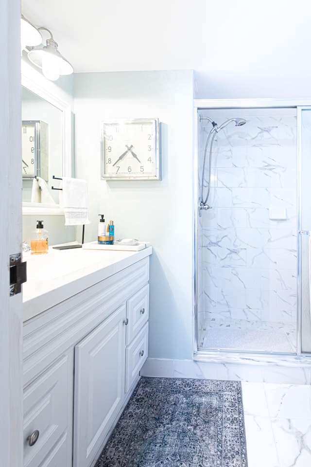 bathroom featuring vanity and walk in shower