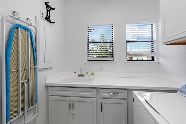 bathroom with vanity and washing machine and clothes dryer