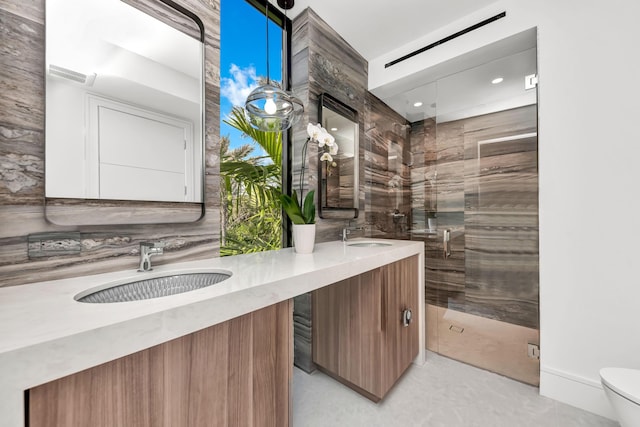 5 S Beach Rd, Jupiter Island, FL 33455 - bathroom featuring a stall shower and double vanity