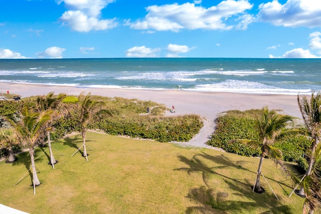 view of water feature with a beach view