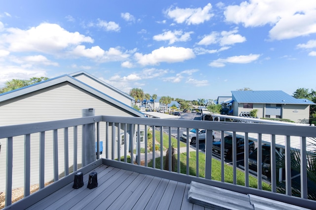 1441 NE 14th Ct Unit 4, Jensen Beach, FL 34957 - wooden deck featuring a residential view
