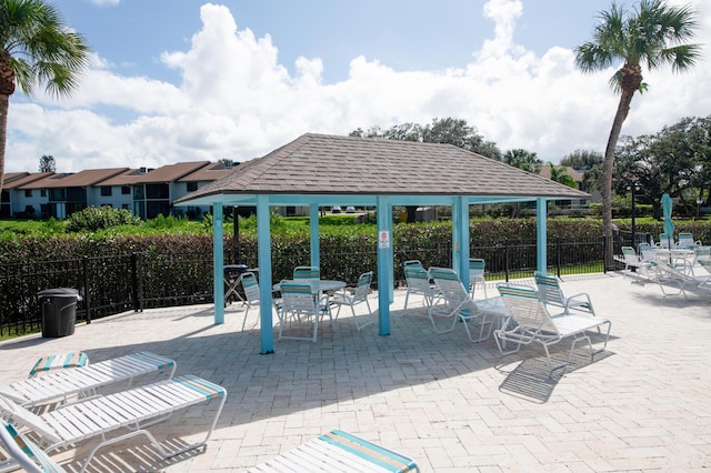 1441 NE 14th Ct Unit 4, Jensen Beach, FL 34957 - view of patio with a gazebo and fence