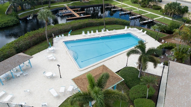 1441 NE 14th Ct Unit 4, Jensen Beach, FL 34957 - community pool with a water view and fence