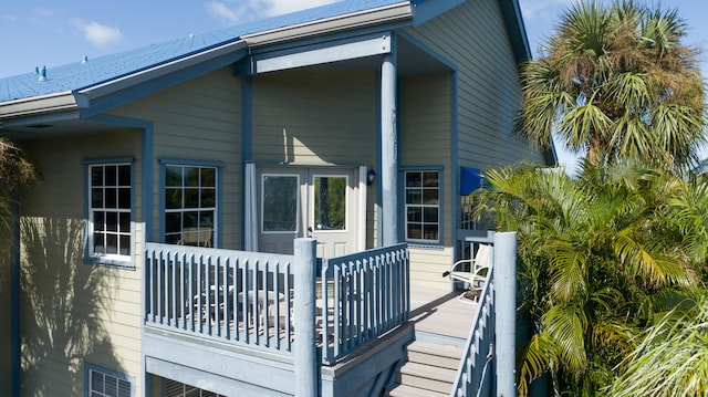 rear view of house with a wooden deck