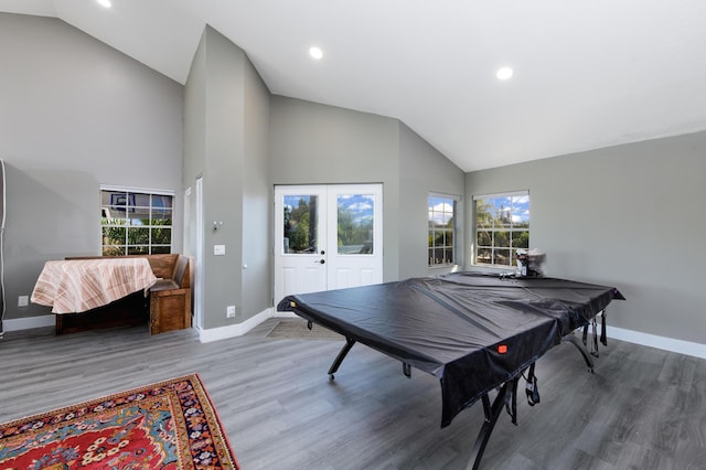 1441 NE 14th Ct Unit 4, Jensen Beach, FL 34957 - rec room featuring baseboards, wood finished floors, french doors, high vaulted ceiling, and pool table
