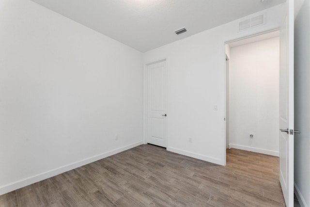 unfurnished bedroom with light hardwood / wood-style floors