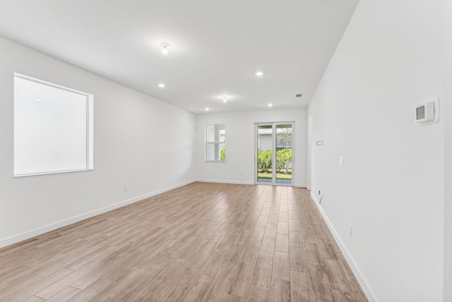 unfurnished room featuring light wood-type flooring