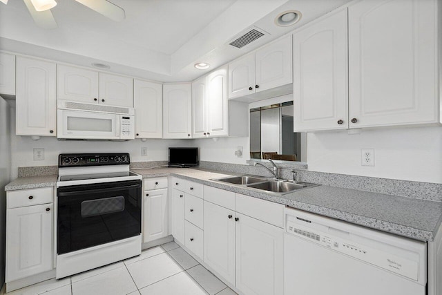 kitchen featuring sink, light tile patterned floors, white cabinets, white appliances, and ceiling fan