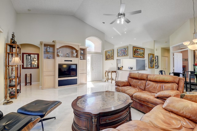 tiled living room with a textured ceiling, high vaulted ceiling, and ceiling fan