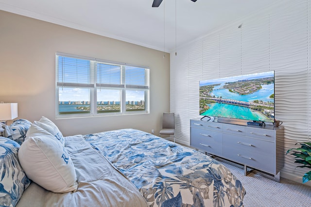 bedroom with ceiling fan, light carpet, and crown molding