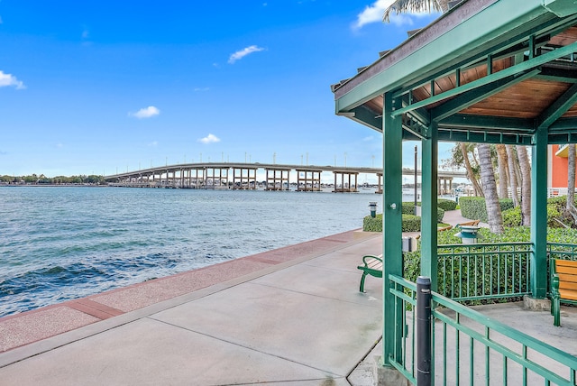 dock area with a water view