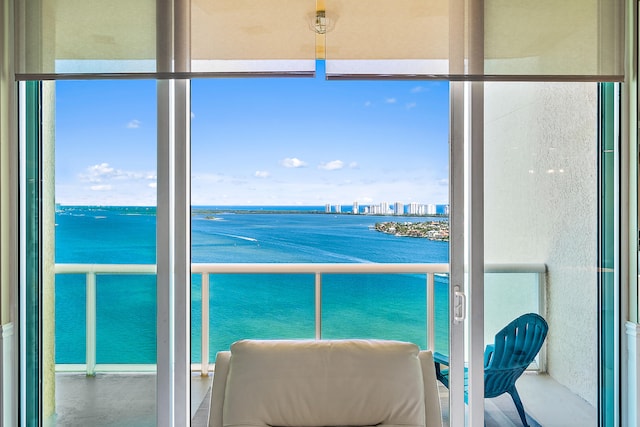 balcony featuring a water view