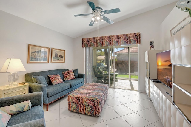 living room with a ceiling fan, vaulted ceiling, and light tile patterned floors