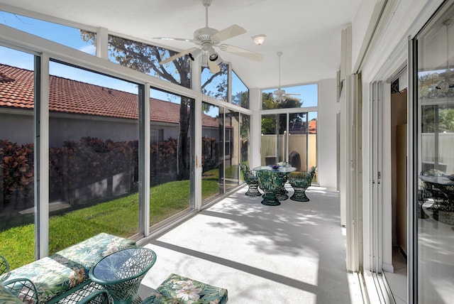 sunroom / solarium with ceiling fan