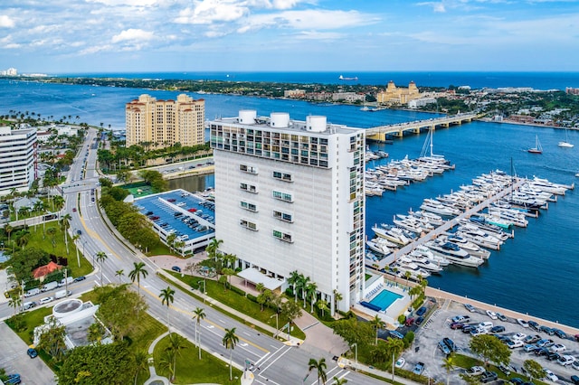 birds eye view of property with a water view